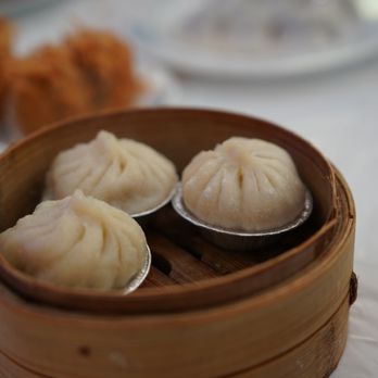 Ocean Palace signature dishes Har Gow (Shrimp Dumplings), Siu Mai (Pork Dumplings), Baked BBQ Pork Buns, Salted Egg Yolk Buns
